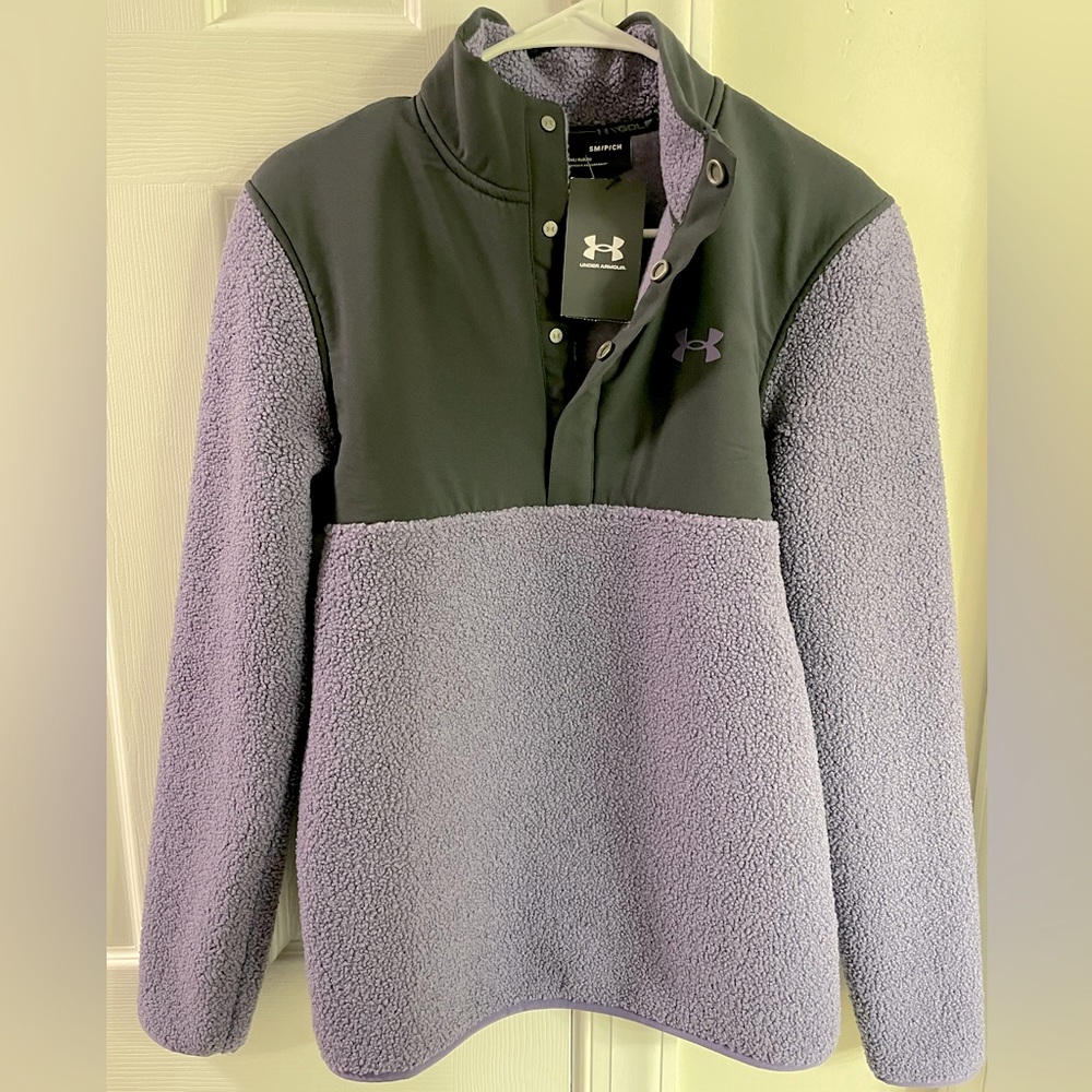 Under Armour Warm Gear Performance pull over Sweatshirt with reinforced buttons.
